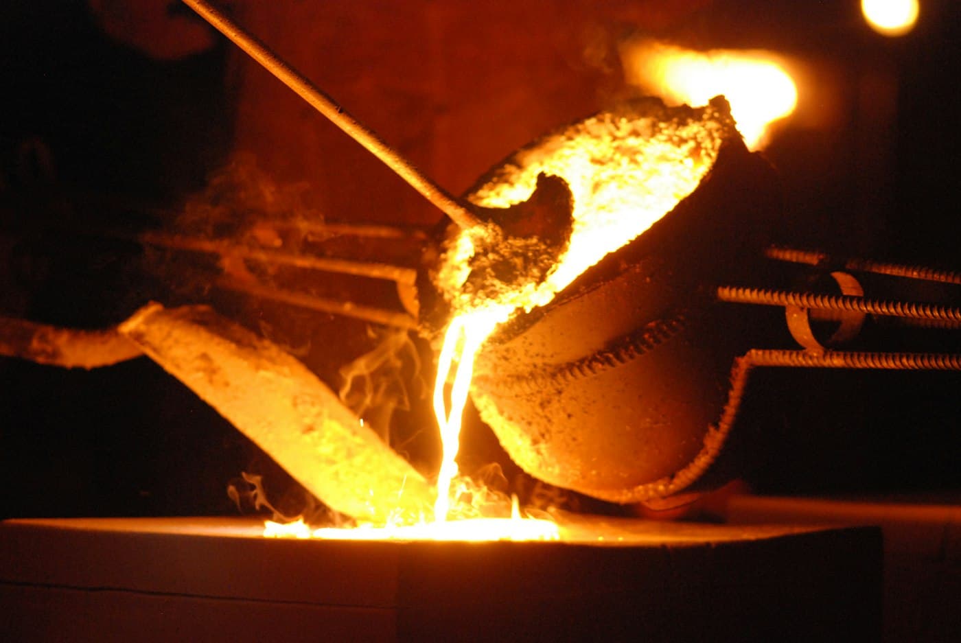 Molten metal being poured from a ladle